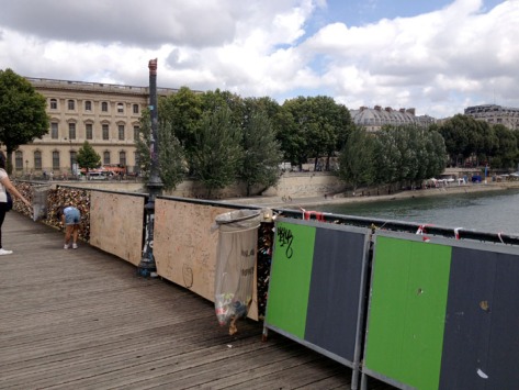 The Pont des Arts after 3 months of heavy tourist traffic.